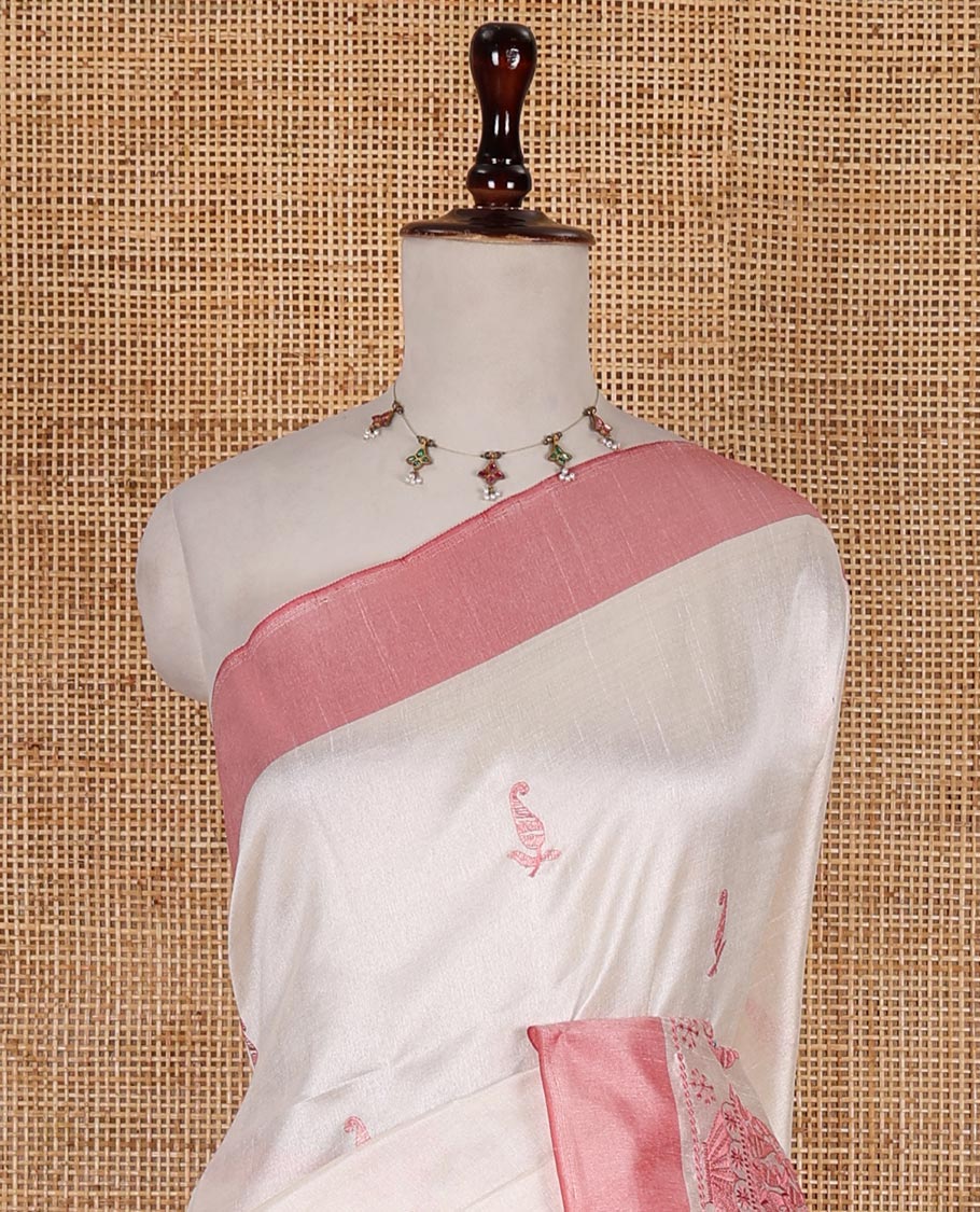 Half-white mango and flower pots thread embroidered semi-tussar saree, contrast peach border, manga motif embroidered pallu, and a matching blouse