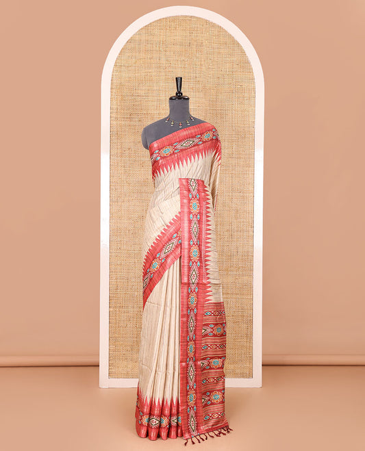 Chikku- maroon plain Katan silk saree, contrast ikkat floral-geometric printed temple border, ikkat printed pallu, and ikkat printed blouse