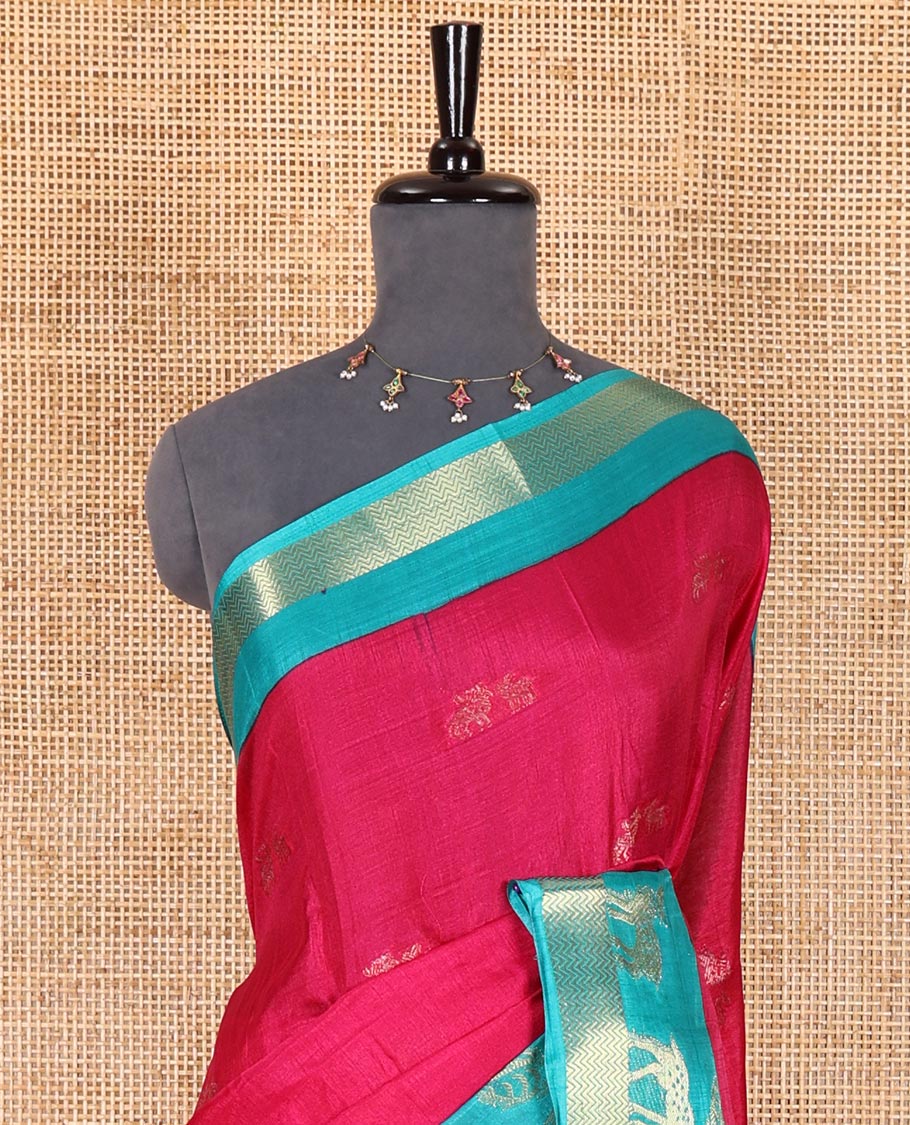 Rani pink deer copper zari buttas dola silk saree, contrast chevron and deer motifs zari border, deer motifs pallu, and contrast deer motifs blouse