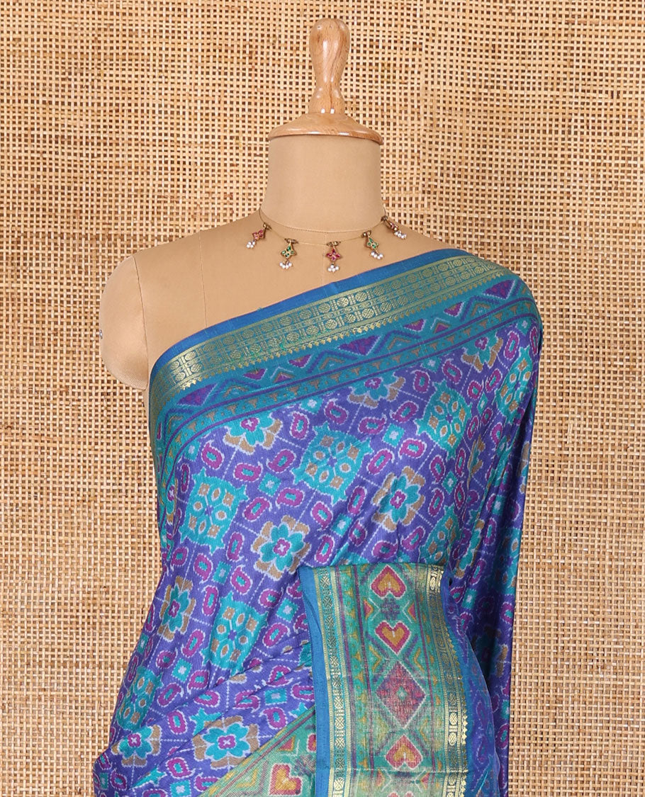 Blue intricate design patola saree, contrast traditional zari and double-ikkat style border, printed pallu, and blouse of print, and zari work