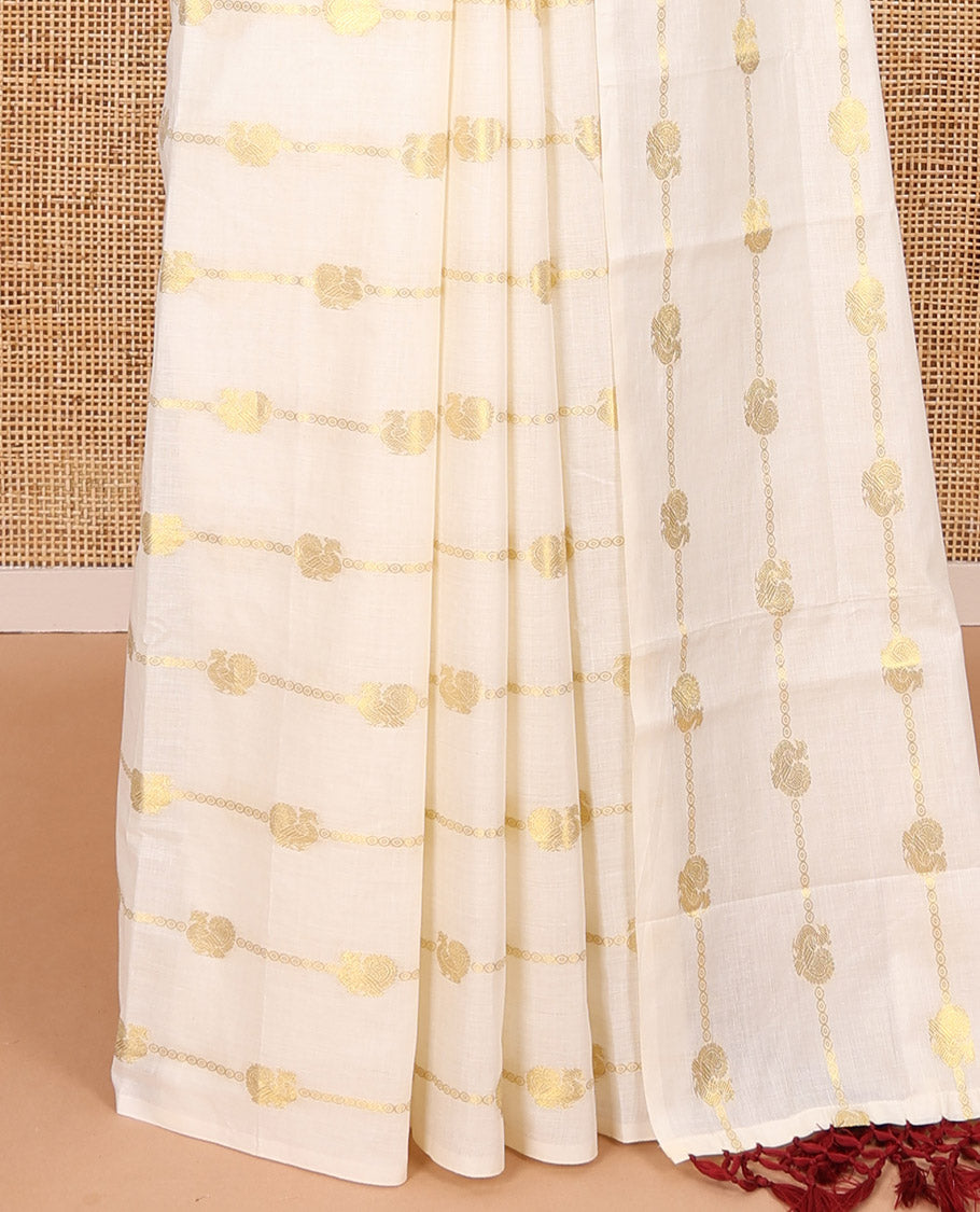 Borderless cream-maroon peacock and horizontal zari striped Kerala cotton saree, self-pallu with tassels, and a matching blouse