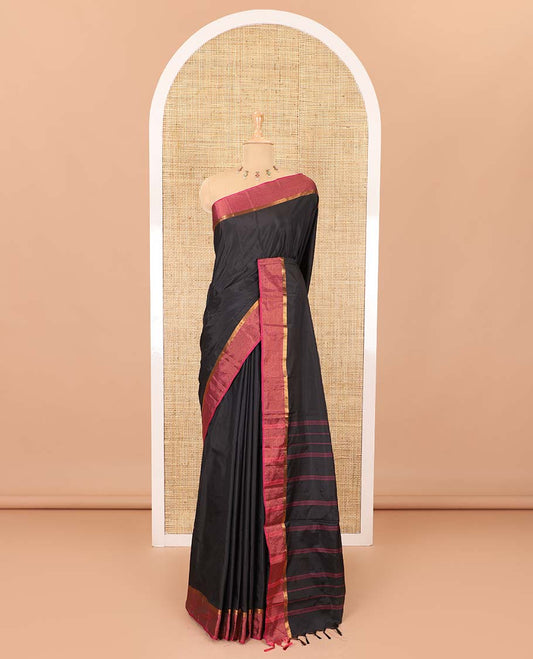 Black plain design semi-soft silk saree, contrast satin striped border, striped pallu, and a matching blouse
