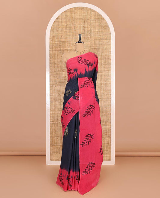 Navy blue paisley motifs block printed mul cotton saree, contrast leaf motifs block printed border, leaf motifs printed pallu, and contrast plain blouse