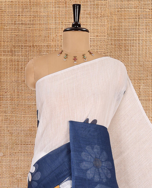 Borderless white-blue 2D-style daisy floral printed linen cotton saree, daisy floral printed pallu, and daisy floral printed blouse