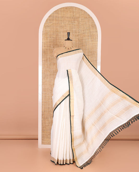 White and green sequins striped Linen cotton saree, contrast zari sequins striped border, striped pallu, and a contrast plain blouse