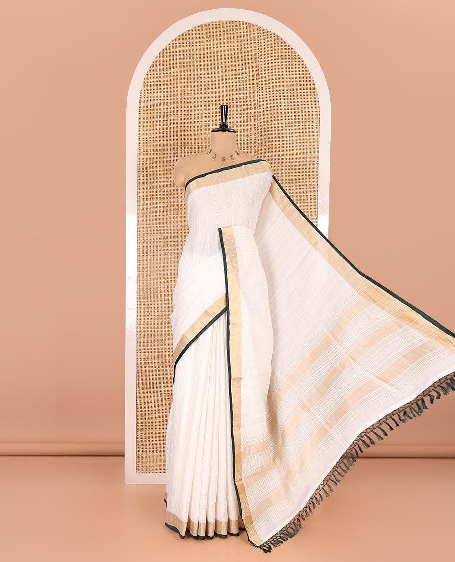 White and green sequins striped Linen cotton saree, contrast zari sequins striped border, striped pallu, and a contrast plain blouse