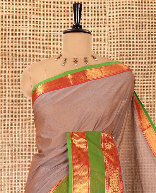 Beige plain Chettinad cotton saree, contrast traditional zari rettai pettu border, striped pallu, and a matching blouse