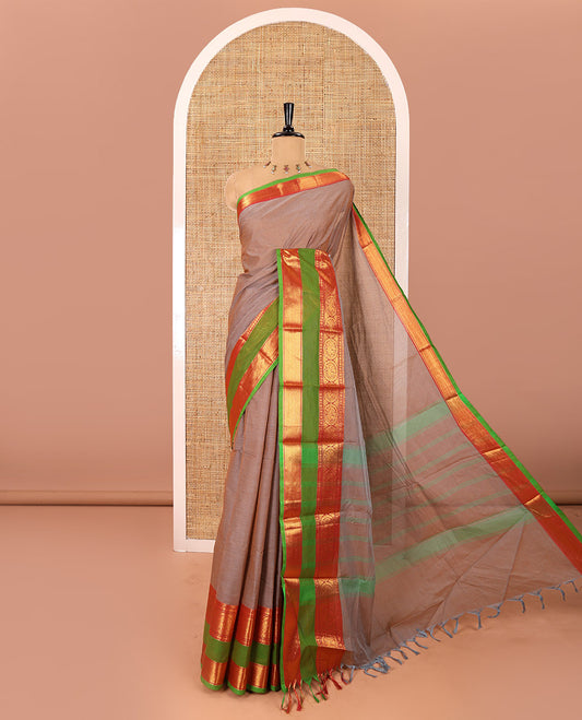 Beige plain Chettinad cotton saree, contrast traditional zari rettai pettu border, striped pallu, and a matching blouse