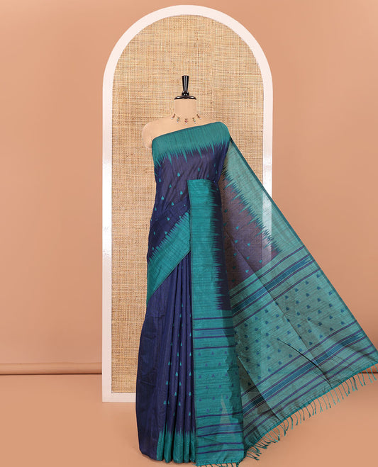 Navy blue buttas semi-jute saree with contrast temple border, thread striped pallu, and a contrast thread buttas blouse