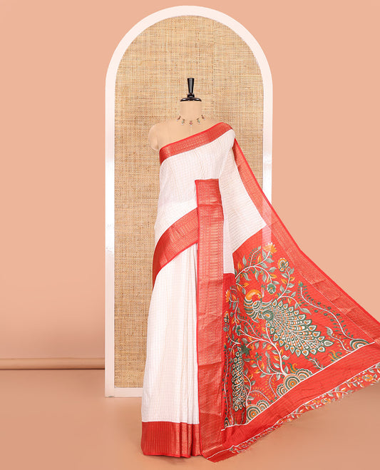 White zari checked dola silk saree, contrast traditional zari border, kalamkari floral-peacock printed pallu, and a kalamkari printed blouse
