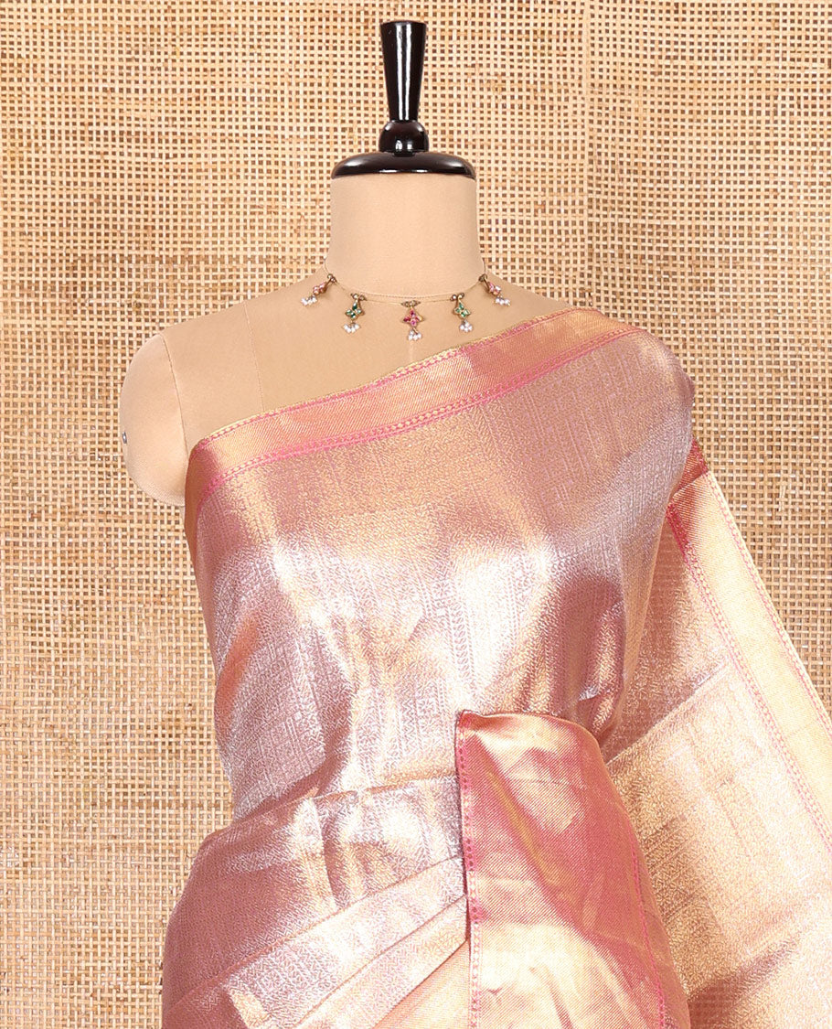 Light Pink Tissue Saree Features Floral Jacquard Design Woven All Over Its Body, Features a Contrast Gleaming Zari Traditional Design Border, Zari-Enriched Pallu, and a Matching Blouse
