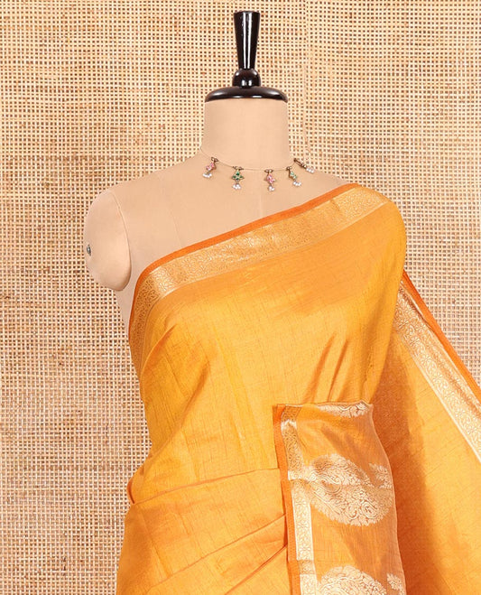 Mustard Plain Semi-Tussar Saree Artfully Detailed with a Self Border Featuring Floral and Paisley Zari Weave, Adorned with a Zari-Striped Pallu, Paired with a Matching Zari-Woven Blouse