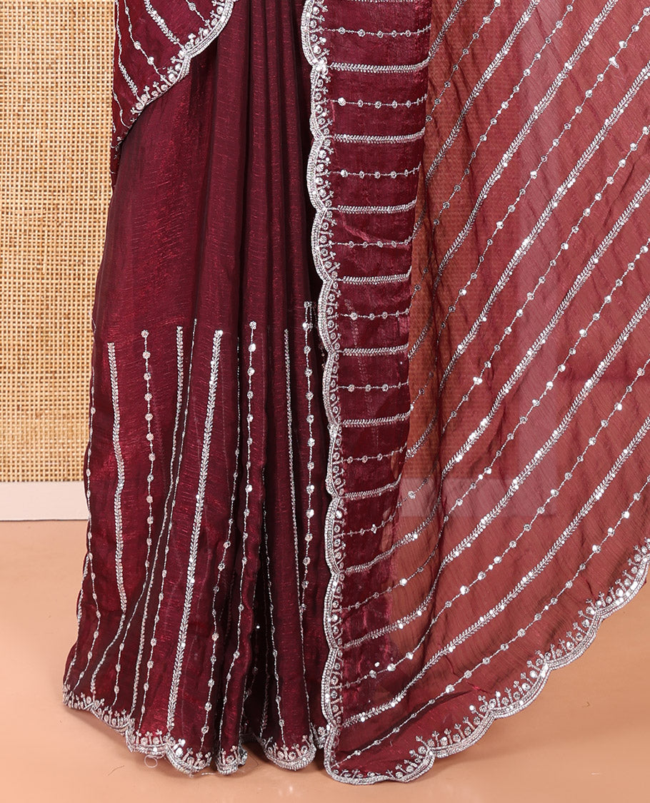 Purple Fendy Chiffon Saree Highlighted with Sequins and Thread Stripes Embroidery, Scallop Embroidered Border, Elegantly Embroidered Pallu, and Paired with a Matching Blouse