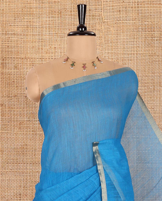 Borderless Blue Plain Linen Cotton Saree, Complemented by 3 Big Circle Motifs Printed Pallu, and Paired with a Contrast Circle Motifs Printed Blouse