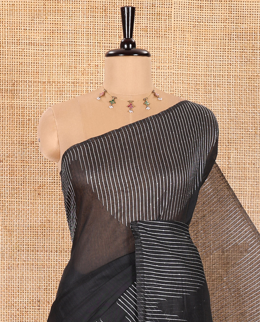 Borderless Black Chanderi Cotton Saree Gleamed up with Sequins and Thread Stripes, Self-Pallu Featuring Sequins and Thread Stripes, and Comes with a Matching Blouse
