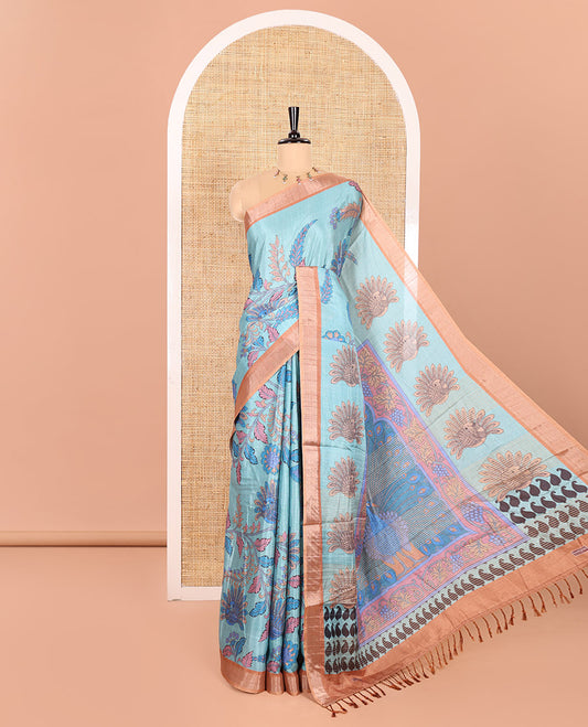 Rama Green Manipuri Silk Saree Elevated with Kalamkari Floral and Peacock Prints All Over Its Body, Complemented by a Contrast Zari Border, Pallu Depicts a Big Peacock and Paisleys, and Paired with a Contrast Printed Blouse