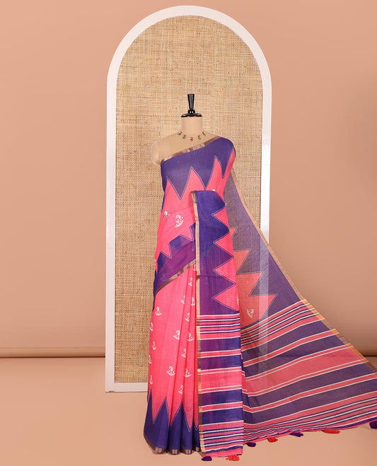 Pink Linen Cotton Saree Delicately Printed with Batik-Style Buttas All Over Its Body, Complemented by a Contrast Temple Zari Piping Border, Striped Pallu, and Paired with a Matching Striped Blouse