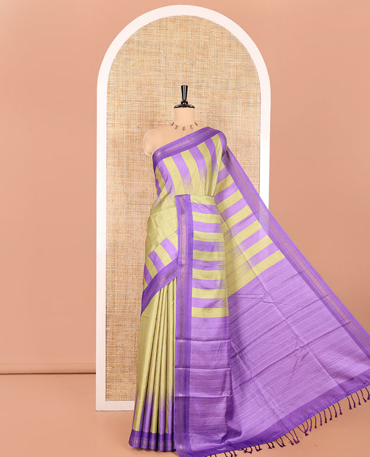 Green Manipuri Silk Saree, Subtly Woven with Vertical Stripes All Over Its Body, Complemented by Contrast Zari Border, Sparsely Striped Pallu, and Paired with a Contrast Blouse