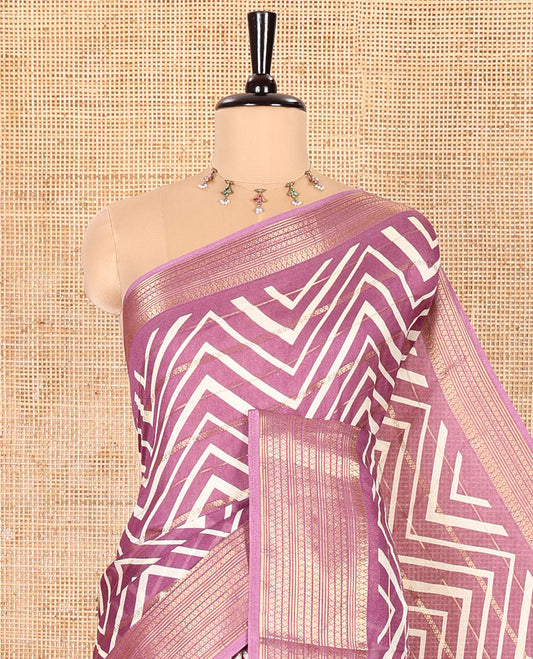 Purple Moss Chiffon Saree Adorned with Horizontal Stripes and Zig-Zag Stripes All Over Its Body, Highlighted by Traditional Zari Design Border, Pallu Depicts Butta Enclosed Checks, and Paired with a Matching Blouse