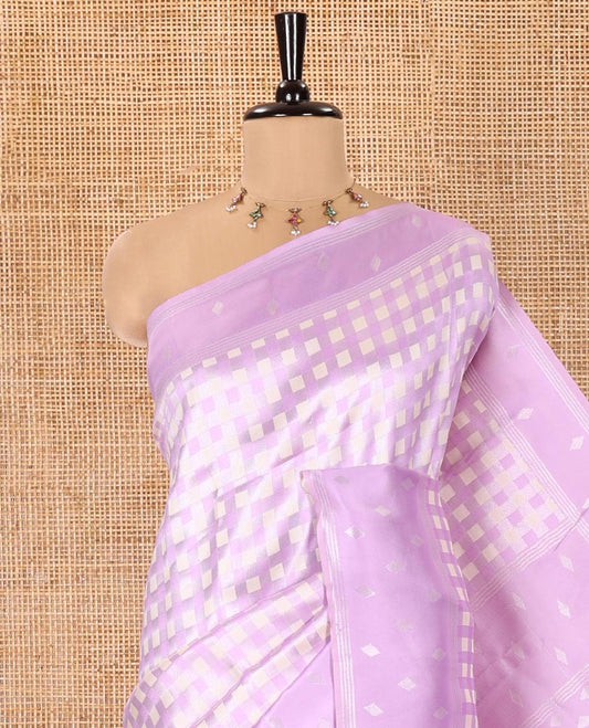 Lavender Kanchi Silk Saree, Enlivened with Checked Design on Its Body, Highlighted by a Self-Border of Diamond Patterns, Pallu Steeped with Buttas, and Paired with a Matching Blouse