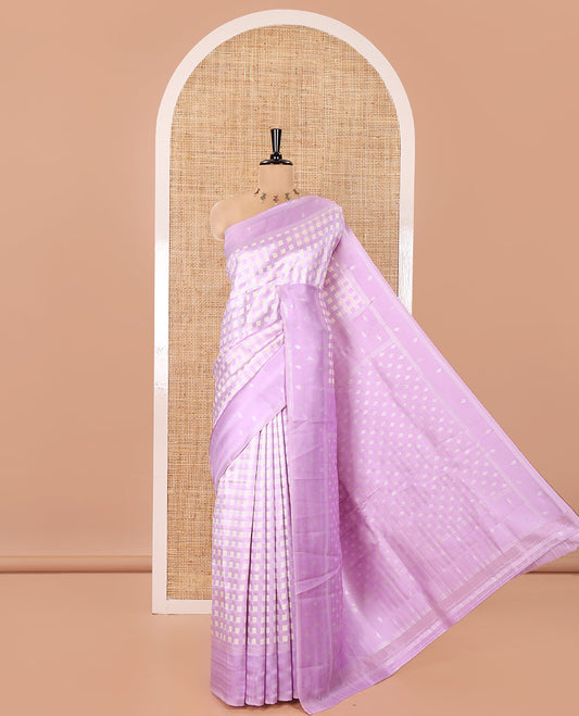 Lavender Kanchi Silk Saree, Enlivened with Checked Design on Its Body, Highlighted by a Self-Border of Diamond Patterns, Pallu Steeped with Buttas, and Paired with a Matching Blouse
