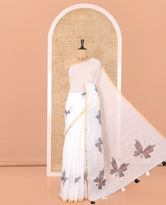 White Linen Cotton Saree, Enthralled with Butterfly Buttas All Over Its Body, Subtle Piping Border, Pallu of Butterfly Print, and Paired with a Contrast Fairy Motifs Printed Blouse