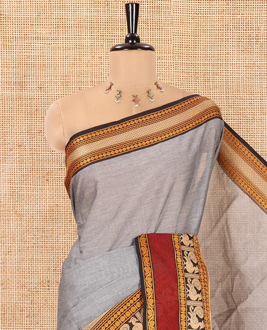 Grey Plain Chettinad Cotton Saree, Complemented by a Contrast Traditional Design Rettai Pettu Border of Peacock Designs, Subtly Striped Pallu, and Comes Without a Blouse