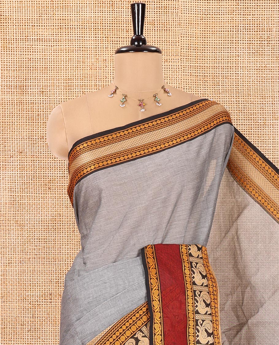 Grey Plain Chettinad Cotton Saree, Complemented by a Contrast Traditional Design Rettai Pettu Border of Peacock Designs, Subtly Striped Pallu, and Comes Without a Blouse