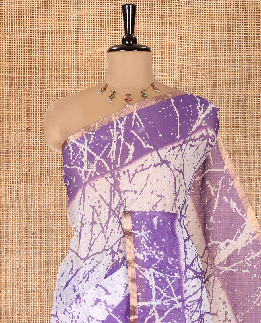 Cream and Lavender Linen Cotton Saree, Decked Up with Batik Print on Its Body, Complemented by Contrast Batik Printed Border, Pallu of Floral Print, and Paired with a Contrast Blouse