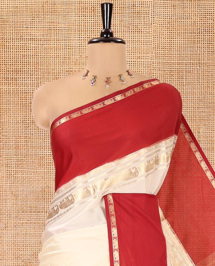 Cream Plain Art Mysore Silk Saree, Complemented by Captivating Contrast Rettai Pettu Traditional Border of Elephant Zari Buttas, Striped Pallu, and Paired with a Contrast Blouse