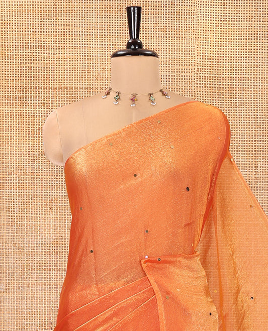 Borderless Orange Fendy Chiffon Saree, Gleamed Up with Sequin Work on Its Body, Highlighted by a Self-Pallu of Sequin Work, and Paired with a Matching Blouse