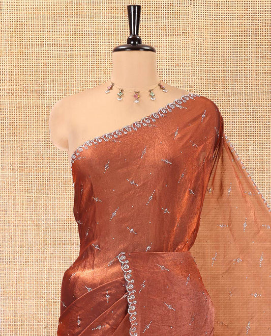 Maroon Fendy Chiffon Saree, Highlighted by Swarovski Stone Work All Over the Body, Gleaming Swarovski Stone Work Border, a Self-Pallu, and Paired with a Fancy Designer Blouse
