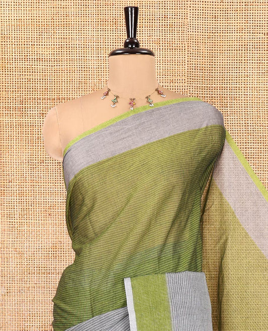 Grey and Mehenti Chettinad Cotton Saree, Decked up with Half-And-Half-Style Horizontal Stripes on Its Body, a Subtle Contrast Border, and Has No Blouse