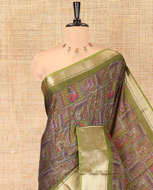 Olive Green Dola Silk Saree Features Kalamkari Peacock-Human Print, a Traditional Zari Border, Printed Pallu, and a Matching Blouse