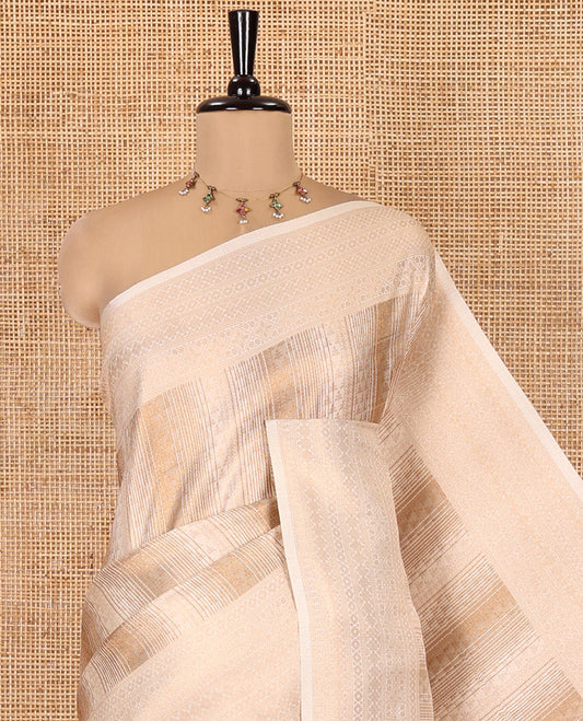 Cream Elite Soft Silk Saree, Enriched with Jacquard Design, Highlighted by Traditional Zari Border, Grand Pallu and a Matching Blouse