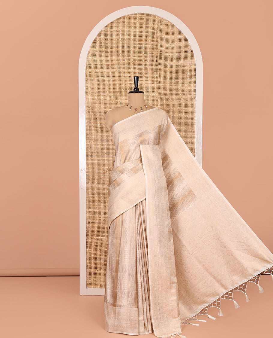 Cream Elite Soft Silk Saree, Enriched with Jacquard Design, Highlighted by Traditional Zari Border, Grand Pallu and a Matching Blouse