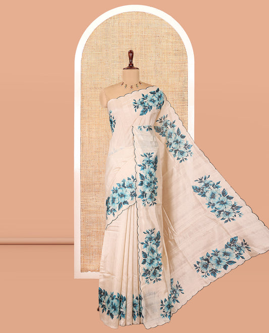 Cream-Blue Semi-Tussar Saree Features Floral Print and Sequined Work, a Scallop Border, a Self-Pallu, and a Matching Blouse