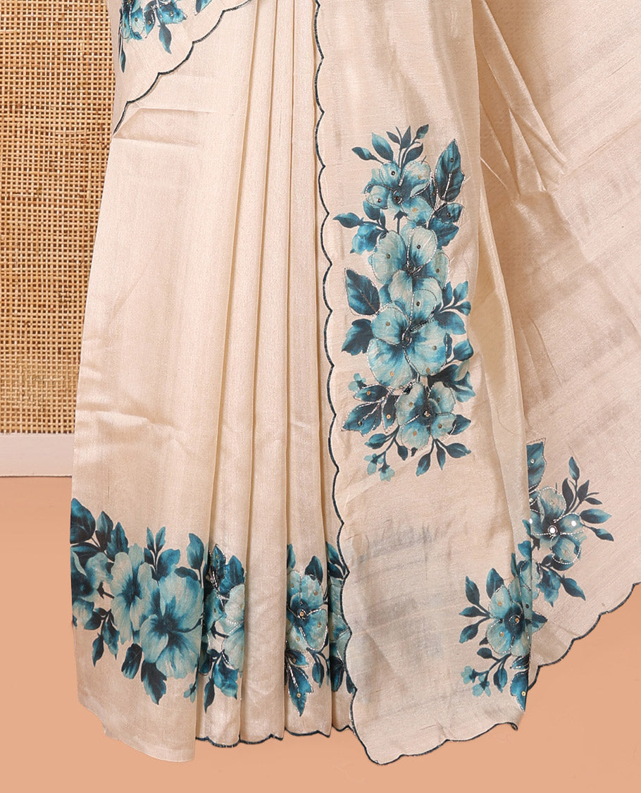 Cream-Blue Semi-Tussar Saree Features Floral Print and Sequined Work, a Scallop Border, a Self-Pallu, and a Matching Blouse