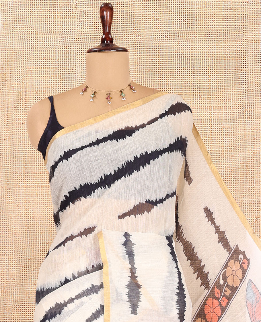 Cream Linen Cotton Saree, Adorned with Shibori Print, a Zari Piping Border, Floral-Peacock Motif Printed Pallu, and Matching Blouse