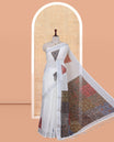 Cream Linen Cotton Saree, Embellished with Triangle Print, a Subtle Zari Border, Ajrakh Patch Printed Pallu, and a Contrast Blouse
