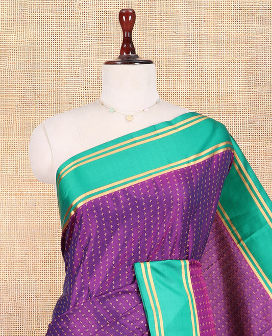 Purple Semi-Soft Silk Saree Steeped with Plus-Shaped Buttas, Contrast Border, and a Matching Blouse