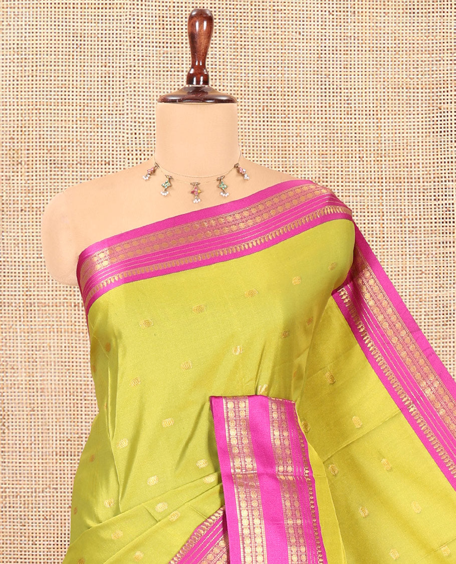 Parrot Green-Purple Softy Silk Saree, Adorned with Zari Buttas, a Contrast Traditional Zari Border, and a Matching Blouse