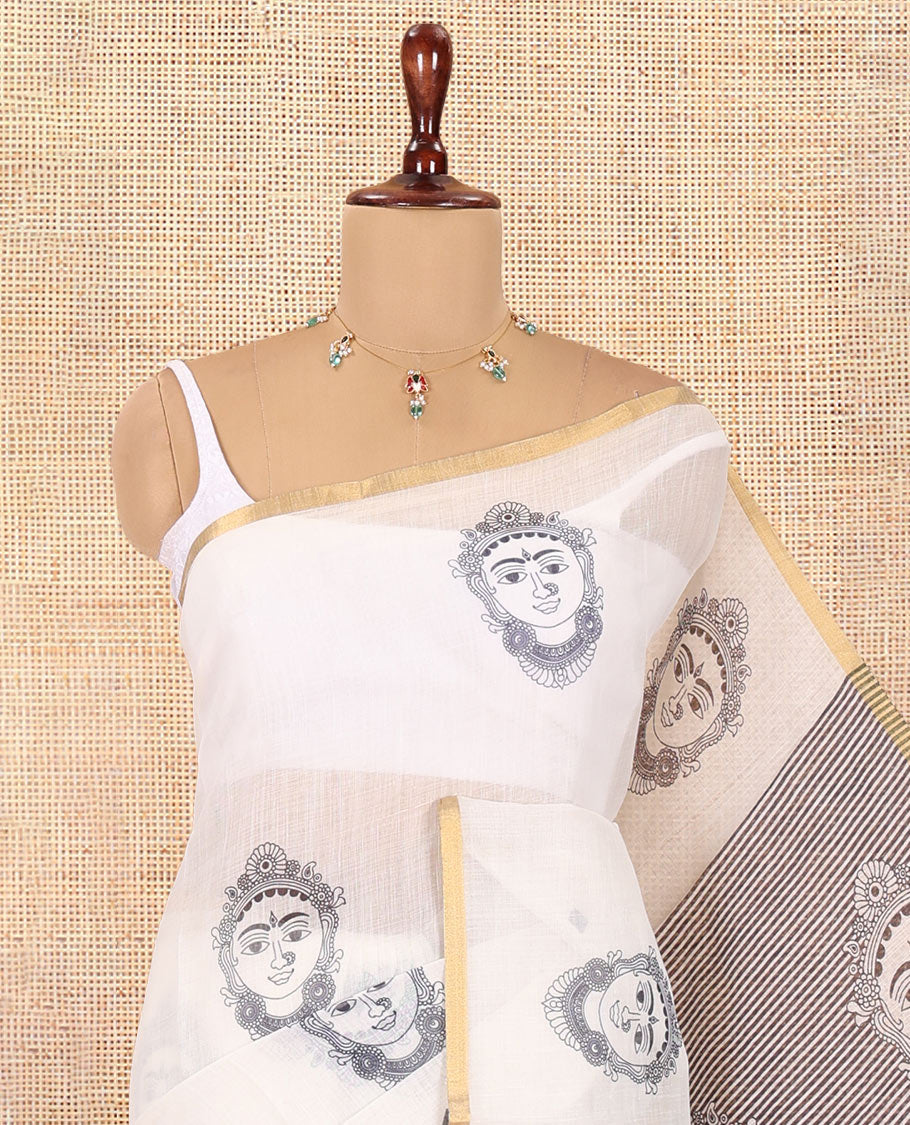 Borderless Cream Linen Cotton Saree, Adorned with Face Print, Contrast Pallu of Chevron Stripes and Face Print, a Contrast Blouse