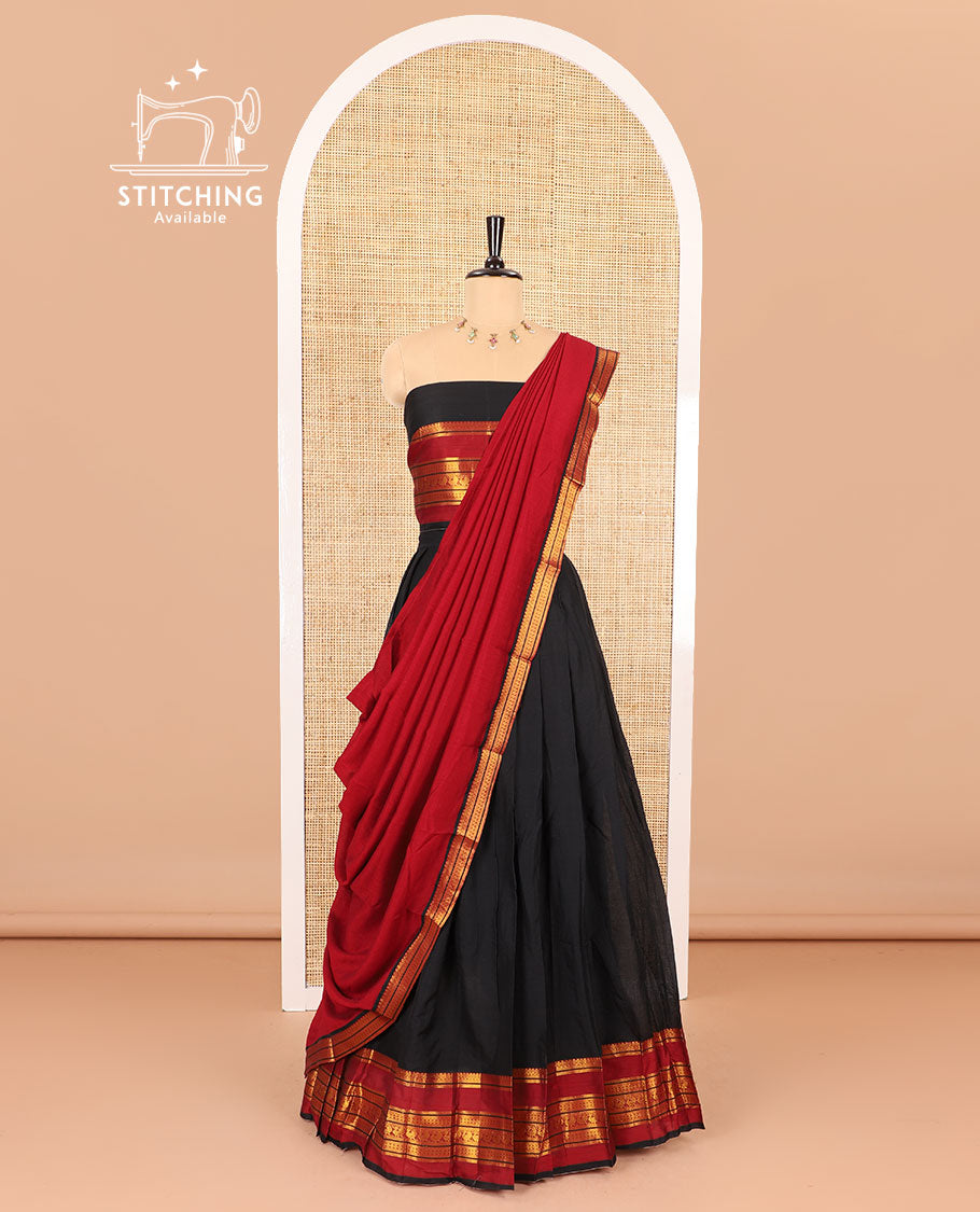 Black half-saree, plain with contrast varisai pettu traditional zari bordered skirt, matching blouse and a plain zari border contrast dhavani