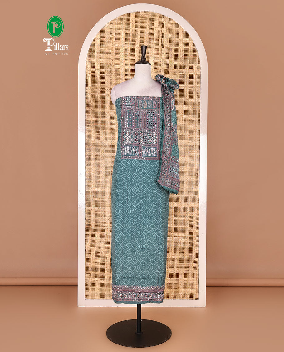 Hunter green material chudidar set, intricately printed with neck mirror work crepe top, Italian crepe bottom, and digital printed mirror work chinon dupatta