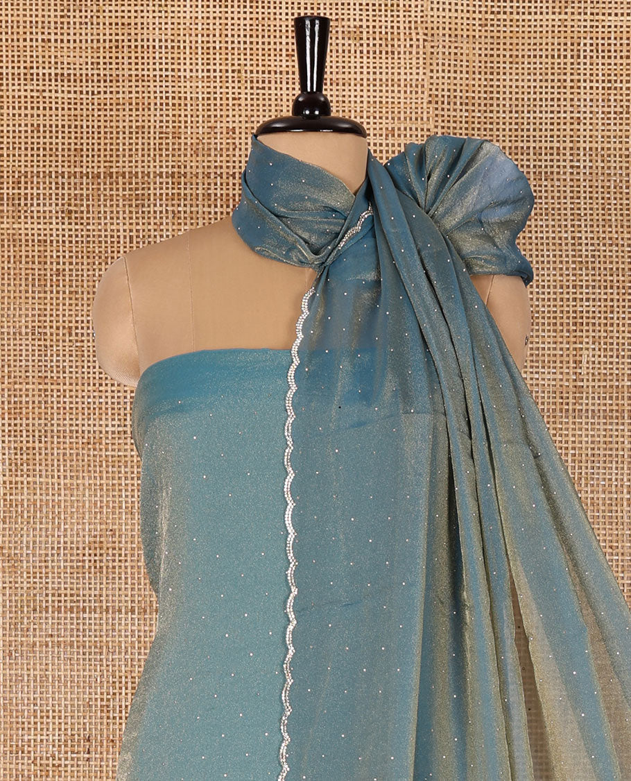 Blue material chudidar set, stone work moss organza top, a matching bottom, and scallop stone work moss organza dupatta