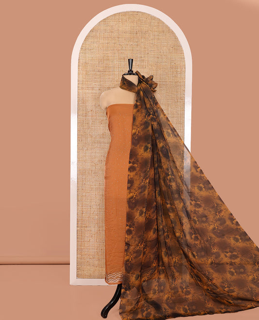 Orange Material Churidar Set, Spotlighted with Swarovski Stone Work Nc Moss Organza Top, Comes with a Plain Santoon Bottom, and Floral Printed Nc Moss Organza Dupatta