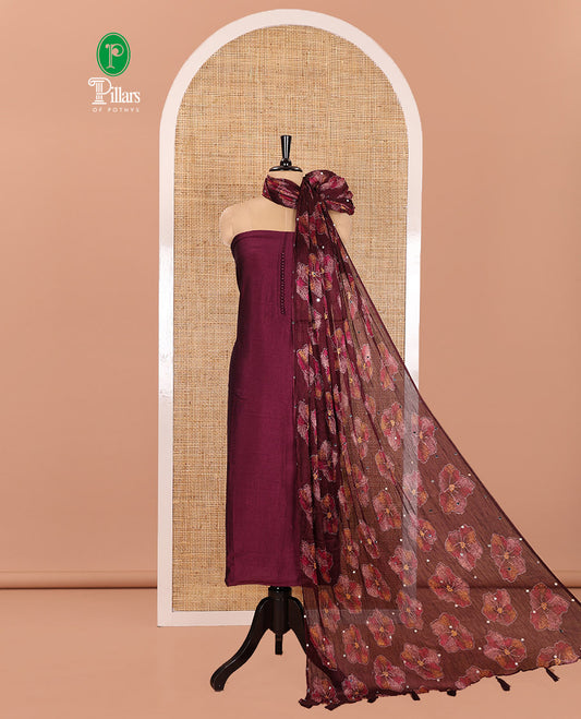Wine Material Churidar Set, Subtly Designed with Plain Vichitra Silk Top, Comes with a Plain Santoon Bottom, and Is Paired with a Crushed Chiffon Dupatta of Floral Print and Mirror Work