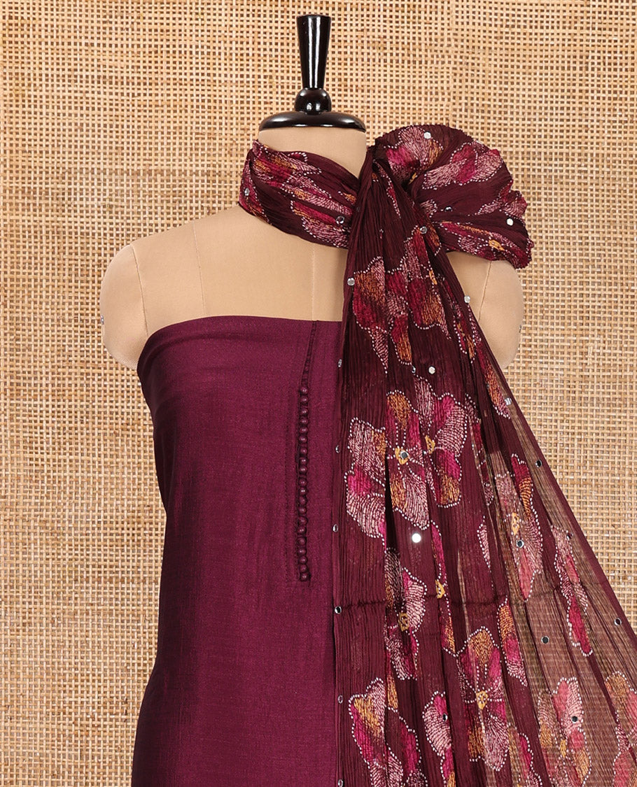 Wine Material Churidar Set, Subtly Designed with Plain Vichitra Silk Top, Comes with a Plain Santoon Bottom, and Is Paired with a Crushed Chiffon Dupatta of Floral Print and Mirror Work