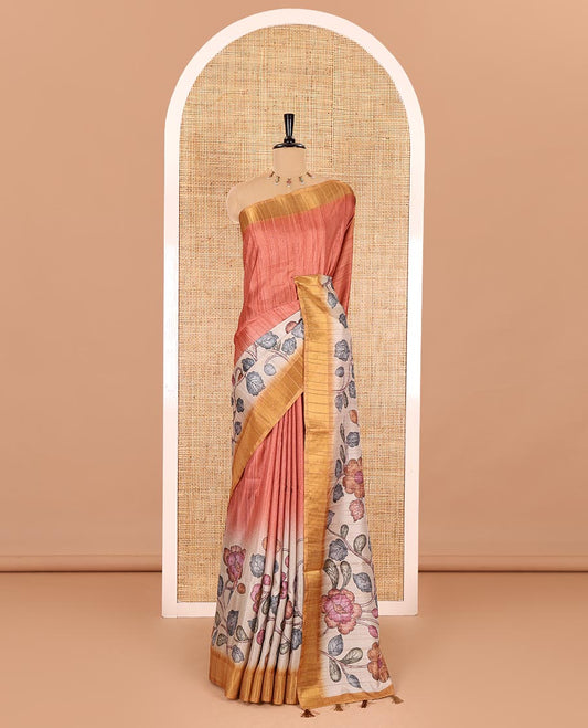Orange plain fancy tussar saree, contrast floral printed border, floral vine printed pallu, and a contrast plain blouse